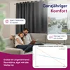 A couple relaxing on a couch in a living room, with a window showing a street scene outside. Produktbild-Vorschau