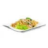 A plate of pasta with garnishes on a white plate. Produktbild-Vorschau