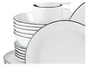 A stack of white ceramic bowls and plates with black trim. Produktbild-Vorschau