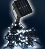 A solar-powered LED string light set with a solar panel and many white lights. Produktbild-Vorschau