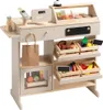 A wooden toy shop counter with various toy food items displayed in crates and on shelves. Náhľad obrázku produktu