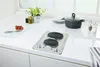 A portable double electric hob on a white countertop. Produktbild-Vorschau