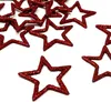 A collection of red glitter stars scattered on a white background. Produktbild-Vorschau