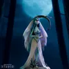 A figurine of Emily from Corpse Bride standing in a dark, moonlit forest. Náhled obrázku produktu