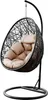 A black hanging egg chair with beige cushions, isolated on a white background. Náhled obrázku produktu