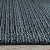A close-up, angled view of a carpet tile with a ribbed texture, showing alternating bands of gray and blue. Produktbild-Vorschau