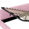 A close-up view of the internal structure of a pink upholstered bed frame, showing the wooden slats and metal support mechanism. Produktbild-Vorschau