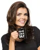 A woman is holding a black mug with white text that says 'HAVE A NICE DAY'. Náhled obrázku produktu