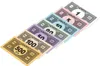 A collection of Monopoly money bills of different denominations, fanned out diagonally on a white background. Produktbild-Vorschau
