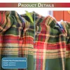 A close-up view of plaid curtains with measurement indicators. Náhled obrázku produktu