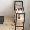 A close-up view of a modern computer desk with shelves, showing a laptop, mouse, and a cup of coffee. Produktbild-Vorschau