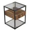 A product shot of a modern nightstand with a glass top, a wooden drawer, and a metal frame, presented on a white background. Produktbild-Vorschau