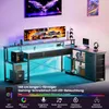 A gaming desk with LED lighting and various accessories. Produktbild-Vorschau