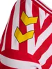 Close-up of a red and white striped jersey with two yellow hummel logos on the sleeve. Produktbild-Vorschau