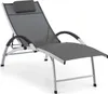 A gray chaise lounge with a headrest and black armrests is shown against a white background. Náhled obrázku produktu