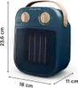 A blue ceramic heater with beige accents and a handle, shown from a 3/4 front angle. Voir les images du produit