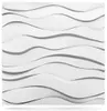 A white, wavy, textured wall panel. Produktbild-Vorschau