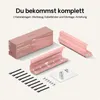 A pink desk cable management system and its accessories are displayed on a light gray background. Voir les images du produit