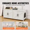 A white wooden cabinet designed to conceal a litter box, with decorative doors and a cat-sized entrance on the side. Text overlays highlight its aesthetic and functional benefits. Produktbild-Vorschau