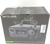 The image shows the product packaging for a Muse M-182 stereo system. Voir les images du produit