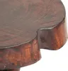 A close-up view of the edge of a dark brown wooden table. Náhled obrázku produktu