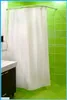 A bathroom with a shower curtain and vanity. Produktbild-Vorschau