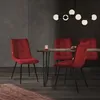 A dining room setting with chairs around a table. Produktbild-Vorschau