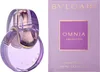A perfume bottle and its packaging are displayed side-by-side against a white background. Podgląd zdjęcia produktu