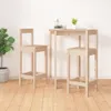A wooden bar table and two bar stools are set up against a white wall on a wooden floor. Produktbild-Vorschau