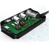 A close-up, cutaway view of a car charger's internal electronic components, including circuit boards, capacitors, and inductors. Podgląd zdjęcia produktu