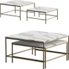 Two sets of nesting coffee tables with marble-like tops and gold metal frames, displayed against a white background. Náhled obrázku produktu