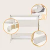 Collage of close-up shots highlighting features of a baby crib/bed. Produktbild-Vorschau