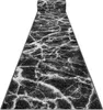 A rolled-up carpet runner with a marble pattern. Voir les images du produit
