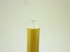 A close-up of a decorative light fixture with a gold glitter base and a clear top with a diamond-like shape. Produktbild-Vorschau