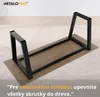 A metal table frame is assembled on a wooden surface, indicating an instruction or part of a product demonstration. Anteprima dell’immagine prodotto