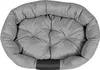 A top-down view of a gray, oval-shaped dog bed with tufted cushioning and raised sides. Anteprima dell’immagine prodotto