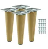 Four wooden furniture legs with metal mounting plates and a set of screws on a white background. Produktbild-Vorschau