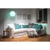 A living room scene with a sofa, floor lamp, and side tables. Anteprima dell’immagine prodotto