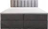 A studio shot of a box spring bed with a headboard and mattress. Produktbild-Vorschau