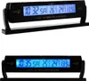 Two views of a black digital thermometer, clock, and voltmeter device with a blue display, mounted on a black stand. Produktbild-Vorschau
