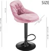 A pink velvet bar stool with dimensions indicated by measurement lines and text. Voir les images du produit