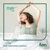 A woman is stretching in bed. Produktbild-Vorschau