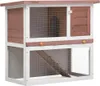 A two-tiered wooden rabbit hutch with wire mesh sides and a ramp. Anteprima dell’immagine prodotto