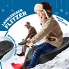 Two people are sledding down a snowy hill on a black sled. Produktbild-Vorschau