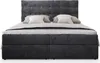 A studio shot of a gray upholstered bed with white pillows and bedding, presented against a white background. Produktbild-Vorschau