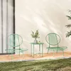 A set of outdoor furniture on a patio with grass in the foreground and a building in the background. Podgląd zdjęcia produktu