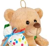 A close-up of a teddy bear holding a gift bag. Produktbild-Vorschau