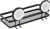 A black metal shower shelf with two white suction cups, shown from a diagonal angle against a white background. Podgląd zdjęcia produktu