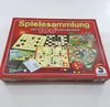 A red box containing various board games and game pieces. Anteprima dell’immagine prodotto