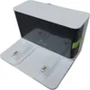 A white and black charging dock for a robot vacuum cleaner. Náhľad obrázku produktu